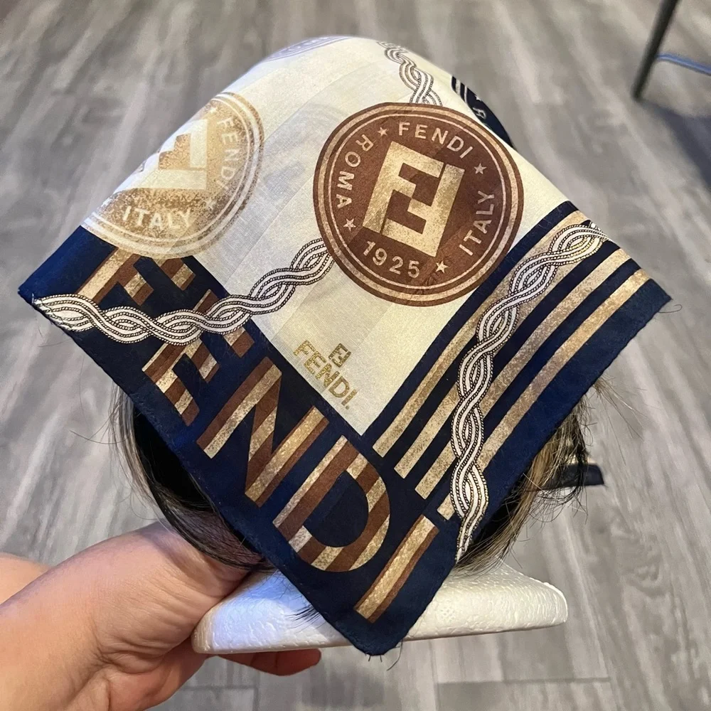 Fendi scarf 23 x 22.5” spend $400 get a free designer scarf valves at $400.